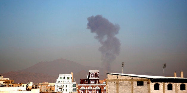 Smoke rises after a Saudi-led airstrike hits an army base in Sanaa, Yemen, Saturday, Dec. 5, 2015. (AP Photo/Hani Mohammed)