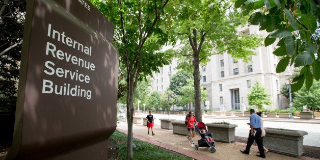 This photo taken Aug. 19, 2015 shows the The Internal Revenue Service (IRS) Building in Washington. No checks, please. If you owe the federal government more than $100 million in taxes, your check is no good at the IRS. Citing technology constraints, the IRS says it will no longer accept checks for more than $100 million. (AP Photo/Andrew Harnik)