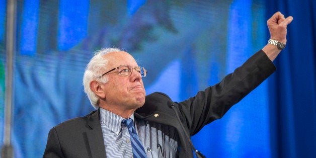 MANCHESTER, NH - SEPTEMBER 19: Democratic Presidential candidate Senator Bernie Sanders (I-VT) makes a fist while talking on stage during the New Hampshire Democratic Party State Convention on September 19, 2015 in Manchester, New Hampshire. Five Democratic presidential candidates are all expected to address the crowd inside the Verizon Wireless Arena. (Photo by Scott Eisen/Getty Images)