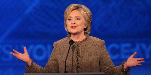 MANCHESTER, NH - DECEMBER 19: Democratic president candidate Hillary Clinton speaks at the debate at Saint Anselm College December 19, 2015 in Manchester, New Hampshire. This is the third Democratic debate featuring Democratic candidates Hillary Clinton, Bernie Sanders and Martin O'Malley. (Photo by Andrew Burton/Getty Images)