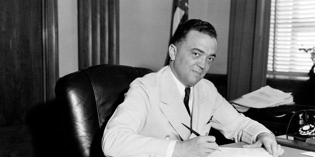 F.B.I. director J. Edgar Hoover is seen in his Washington office, date unknown. (AP Photo)