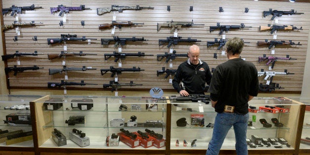 LAKEWOOD, CO - January 05: Bristlecone Shooting, Training and Retail Center customer service representative Steve MacGregor,