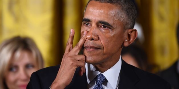 US President Barack Obama gets emotional as he delivers a statement on executive actions to reduce gun violence on January 5, 2016 at the White House in Washington, DC. AFP PHOTO/JIM WATSON / AFP / JIM WATSON (Photo credit should read JIM WATSON/AFP/Getty Images)