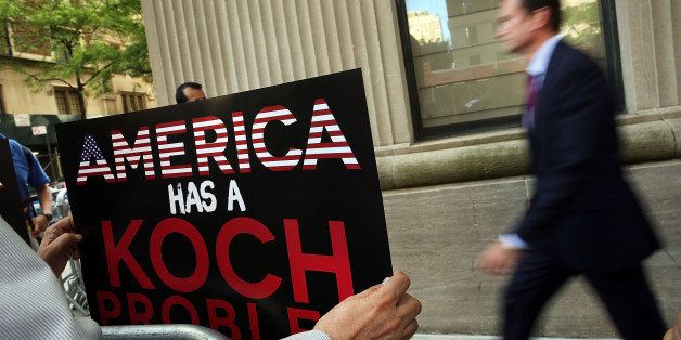 NEW YORK, NY - JUNE 05: Activists hold a protest near the Manhattan apartment of billionaire and Republican financier David Koch on June 5, 2014 in New York City. The demonstrators were protesting against the campaign contributions by the billionaire Koch brothers who are owners of Koch Industries Inc. The brothers have become a focus of Democrats and liberals as they are accused of skewing the political playing field with their finances. (Photo by Spencer Platt/Getty Images)
