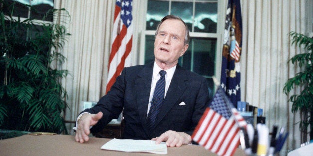 U.S. President George H. Bush addresses the nation from the Oval Office, Wednesday, Jan. 16, 1991 in Washington, after U.S. forces began military action against Iraq. The action has been code named Operation Desert Storm. (AP Photo/Charles Tasnadi)