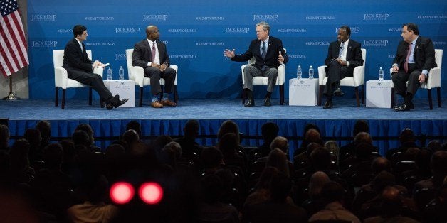 Republican presidential candidates Jeb Bush, center, Ben Carson and New Jersey Gov. Chris Christie, right, participate in an economic forum as House Speaker Paul Ryan of Wis., left, and Sen. Tim Scott, R-S.C. moderate the event Saturday, Jan. 9, 2016, in Columbia, S.C. (AP Photo/Sean Rayford)