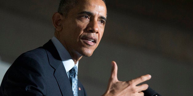 In this Dec. 15, 2015, photo, President Barack Obama speaks during a naturalization ceremony at the National Archives in Washington. Obama is preparing to take questions from reporters at the White House on Dec. 18, before starting his annual Hawaii vacation. (AP Photo/Evan Vucci)