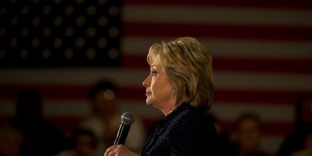 Democratic presidential candidate Hillary Clinton pauses for a moment while speaking at a rally Monday, Jan. 11, 2016, in Waterloo, Iowa. (AP Photo/Jae C. Hong)