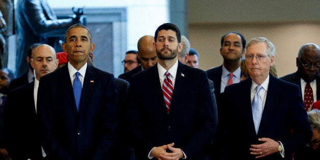 WASHINGTON, DC - DECEMBER 09: US President Barack Obama (L) stands next to Speaker of the House Paul Ryan (C) and Senate Majority Leader Mitch McConnell (R), after delivering remarks at an event commemorating the 150th anniversary of the 13th Amendment, which formally abolish slavery, on Capitol Hill, in Washington, DC, December 9, 2015. Members of both the House and Senate, including Congressional leadership and the Congressional Black Caucus attend. House and Senate Leaders hosted the ceremony to celebrate 150th anniversary of the ratification of the 13th Amendment to the U.S. Constitution, which formally abolished slavery. (Photo by Aude Guerrucci-Pool/Getty Images)