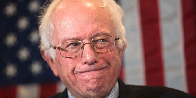 Democratic presidential candidate, Sen. Bernie Sanders, I-Vt, smiles as former Sen. Paul Kirk, D-Mass., not pictured, endorses him during a press conference before a campaign stop at Dartmouth College, Thursday, Jan. 14, 2016, in Hanover, N.H. (AP Photo/John Minchillo)