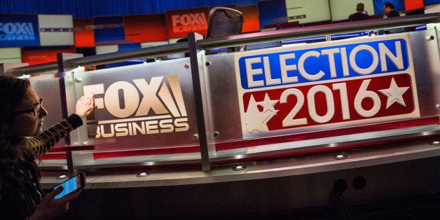 NORTH CHARLESTON, SC - JANUARY 14: Workers prepare the debate hall for the Fox Business Network Republican presidential debate at the North Charleston Coliseum and Performing Arts Center on January 14, 2016 in North Charleston, South Carolina. The sixth Republican debate will be held in two parts; the main prime-time debate for the top seven candidates in the polls and an earlier debate for the remaining candidates. (Photo by Andrew Burton/Getty Images)