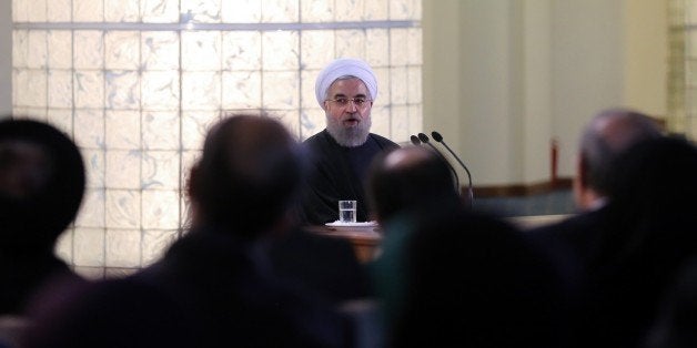 TEHRAN, IRAN - JANUARY 17: Iranian President Hassan Rouhani (C) gives a speech during a press conference in Tehran, Iran on January 17, 2016. Yesterday, international sanctions on Iran were lifted within nuclear deal. (Photo by Fatemeh Bahrami/Anadolu Agency/Getty Images)