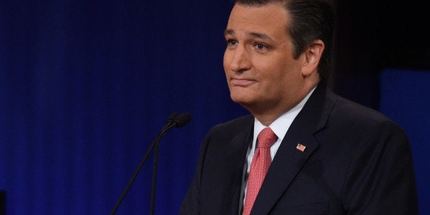 Republican Presidential candidate Texas Senator Ted Cruz looks on during the Republican Presidential debate sponsored by Fox