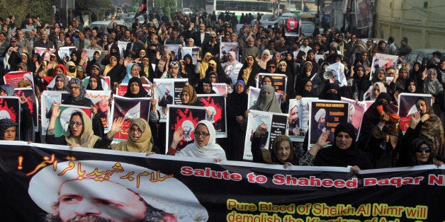 FILE -- In this Sunday, Jan. 3, 2016 file photo, Shiite Muslims take part in a rally to condemn the execution of Saudi Shiite cleric Sheikh Nimr al-Nimr, in Lahore, Pakistan. Diplomatic tensions between Saudi Arabia and Iran, which began with the kingdomâs execution of al-Nimr and later saw attacks on Saudi diplomatic posts in the Islamic Republic, have seen countries around the world respond. Some nations have followed the Saudisâ lead in severing or downgrading ties with Iran, while others have offered words of caution. (AP Photo/K.M. Chaudary, File)