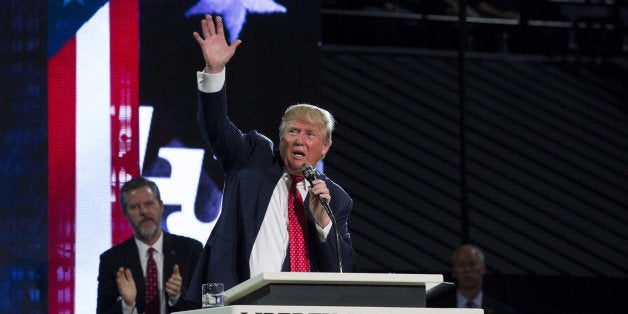 Donald Trump, president and chief executive of Trump Organization Inc. and 2016 Republican presidential candidate, waves to the crowd after speaking during a Liberty University Convocation in Lynchburg, Virginia, U.S., on Monday, Jan. 18, 2016. Real Clear Politics average of recent opinion polls show Trump running marginally ahead of Senator Ted Cruz in Iowa but holding a bigger lead in New Hampshire. Photographer: Drew Angerer/Bloomberg via Getty Images