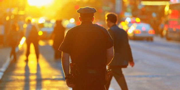 Police officer at sunset in New York City