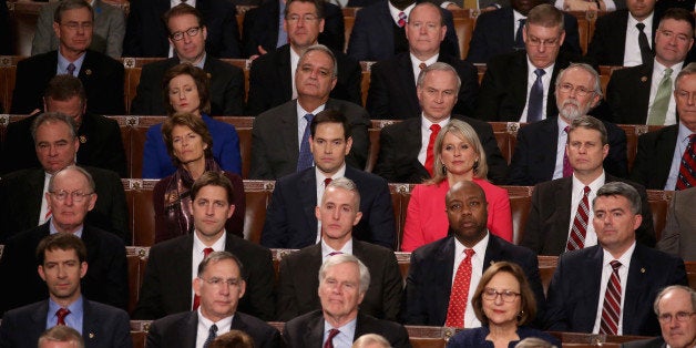 WASHINGTON, DC - JANUARY 12: Members of congress including Republican presidential candidate Sen. Marco Rubio (R-FL) (C) listen to US President Barack Obama deliver the State of the Union speech in the House chamber of the U.S. Capitol January 12, 2016 in Washington, DC. In his last State of the Union, President Obama reflected on the past seven years in office and spoke on topics including climate change, gun control, immigration and income inequality. (Photo by Mark Wilson/Getty Images)