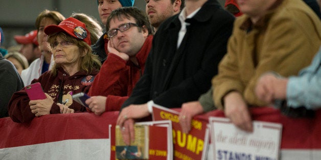 AMES, IA - JANUARY 19: Supporters look on as Republican presidential candidate Donald Trump speaks at Hansen Agriculture Student Learning Center at Iowa State University on January 19, 2016 in Ames, IA. Trump received the endorsement of former Alaska Gov. Sarah Palin. (Photo by Aaron P. Bernstein/Getty Images)