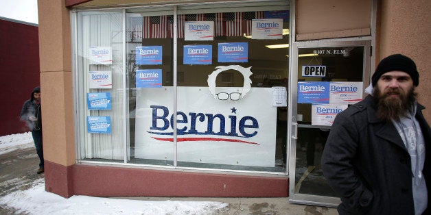 CRESTON, IA - JANUARY 22: A man stands outside the headquarters for Democratic presidential candidate Bernie Sanders on Janua