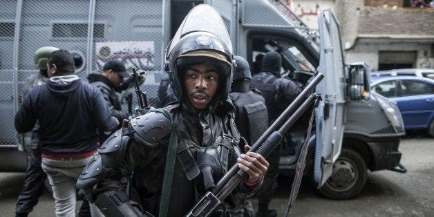 Members of the Egyptian police special forces patrol streets in al-Haram neighbourhood in the southern Cairo Giza district on January 25, 2016 in order to head off potential protests against President Abdel Fattah al-Sisi's government.Egyptians marked the fifth anniversary of the uprising that toppled Hosni Mubarak amid tight security and a warning from the new regime that demonstrations will not be tolerated. / AFP / MAHMOUD KHALED (Photo credit should read MAHMOUD KHALED/AFP/Getty Images)