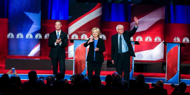 Democratic presidential candidate, former Maryland Gov. Martin O'Malley , left, Democratic presidential candidate, Hillary Clinton and Democratic presidential candidate, Sen. Bernie Sanders, I-Vt, stand together before the start of the NBC, YouTube Democratic presidential debate at the Gaillard Center, Sunday, Jan. 17, 2016, in Charleston, S.C. (AP Photo/Stephen B. Morton)