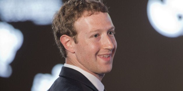 Facebook CEO Mark Zuckerberg asks a question during the CEO Summit of the Americas panel discussion in Panama City, Panama, Friday, April 10, 2015. (AP Photo/Pablo Martinez Monsivais)