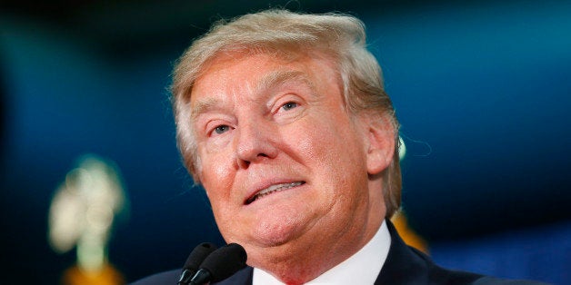 Republican presidential candidate Donald Trump speaks during a campaign event at the University of Iowa Field House, Tuesday,