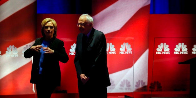 Democratic presidential candidate, Hillary Clinton and Democratic presidential candidate, Sen. Bernie Sanders, I-Vt. speak as