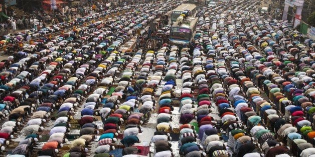 DHAKA, BANGLADESH - JANUARY 8: Hundreds of Muslims take friday prayers in congregation grounds as Muslims take part in Biswa Istema, the second largest religious gathering of Muslims in the world, in Tongi 20 km from Dhaka on January 08, 2016. The first phase of three day long Biswa Istema starts today where 3 million people from home and abroad will take part. (Photo by Zakir Hossain Chowdhury/Anadolu Agency/Getty Images)