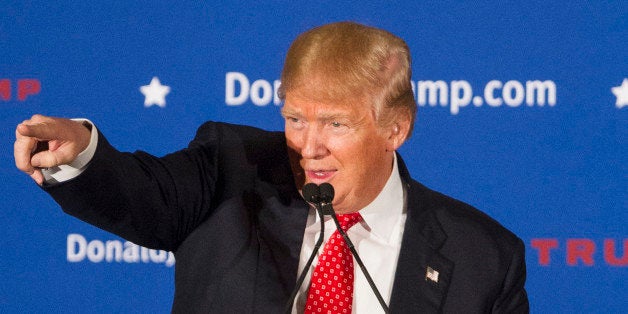 NASHUA, NH - JANUARY 29: Republican presidential candidate Donald Trump on stage during a Town Hall on January 29, 2016 in N