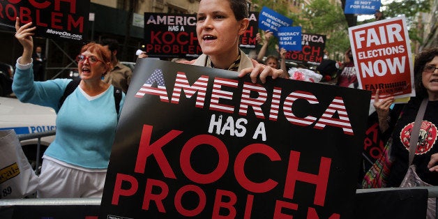 NEW YORK, NY - JUNE 05: Activists hold a protest near the Manhattan apartment of billionaire and Republican financier David Koch on June 5, 2014 in New York City. The demonstrators were protesting against the campaign contributions by the billionaire Koch brothers who are owners of Koch Industries Inc. The brothers have become a focus of Democrats and liberals as they are accused of skewing the political playing field with their finances. (Photo by Spencer Platt/Getty Images)