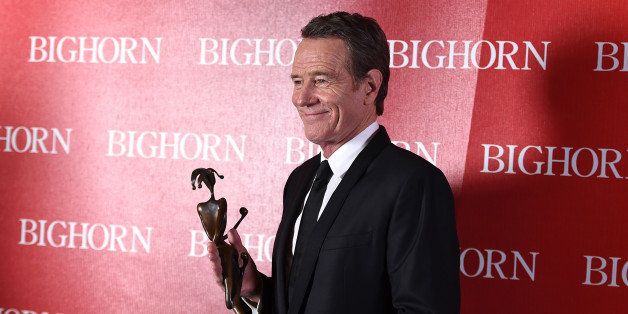 Bryan Cranston poses backstage with the spotlight award - actor for âTrumbo at the 27th annual Palm Springs International Film Festival Awards Gala on Saturday, Jan. 2, 2016, in Palm Springs, Calif. (Photo by Jordan Strauss/Invision/AP)