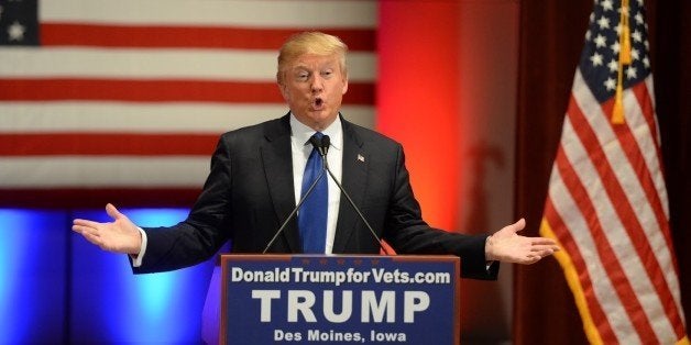 Donald Trump speaks during a campaign rally raising funds for US military veterans at Drake University in Des Moines, Iowa on January 28, 2016. US Republicans scrambling to win the first contest in the presidential nomination race were gearing for battle at high-profile debate in Iowa, but frontrunner Donald Trump is upending the campaign by defiantly refusing to attend. Trump's gamble has left the presidential race in uncharted waters just days before Iowans vote on February 1, insisting he will not back down in his feud with debate host Fox News.Instead, the billionaire has doubled down, hosting a rogue, rival event for US military veterans at the same time that his own party is showcasing its candidates for president to all-important Iowa voters. / AFP / William EDWARDS (Photo credit should read WILLIAM EDWARDS/AFP/Getty Images)