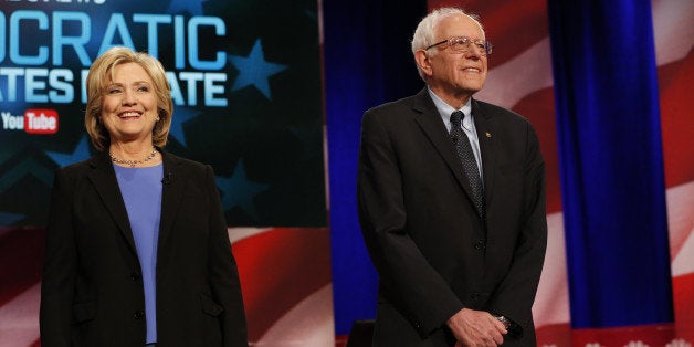 Hillary Clinton, former Secretary of State and 2016 Democratic presidential candidate, left, and Senator Bernie Sanders, an independent from Vermont and 2016 Democratic presidential candidate, participate in the Democratic presidential candidate debate in Charleston, South Carolina, U.S., on Sunday, Jan. 17, 2016. Hours before Sunday's Democratic debate, the two top Democratic contenders held a warm-up bout of sorts in multiple separate appearances on political talk shows, at a time when the polling gap between the pair has narrowed in early-voting states. Photographer: Patrick T. Fallon/Bloomberg via Getty Images