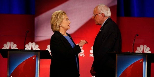 Democratic presidential candidate, Hillary Clinton and Democratic presidential candidate, Sen. Bernie Sanders, I-Vt. speak du