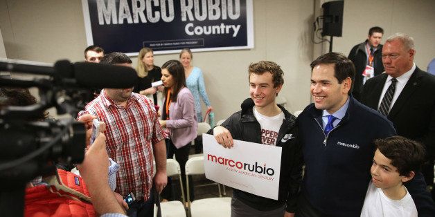 STRATHAM, NH - FEBRUARY 04: Republican presidential candidate Sen. Marco Rubio (R-FL) poses for photographs at the conclusion of a campaign town hall event at the Timberland company headquarters February 4, 2016 in Stratham, New Hampshire. Rubio is hoping to gather momentum in New Hampshire after placing third in Monday's Iowa caucuses, finishing one percentage point behind Donald Trump and four points behind the winner, Sen. Ted Cruz (R-TX). (Photo by Chip Somodevilla/Getty Images)