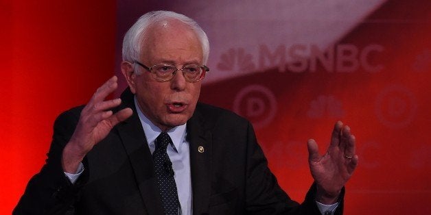 US Democratic presidential candidate Bernie Sanders speaks during the MSNBC Democratic Candidates Debate with Hillary Clinton at the University of New Hampshire in Durham on February 4, 2016. Clinton and Sanders face off on February 4, in the first debate since their bruising Iowa clash that the former secretary of state won by a hair, as they gear for a battle royale in New Hampshire. / AFP / Jewel Samad (Photo credit should read JEWEL SAMAD/AFP/Getty Images)