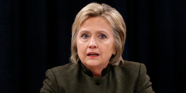 Democratic presidential candidate Hillary Clinton meets with officials at the House Of Prayer Missionary Baptist Church, Sunday, Feb. 7, 2016 in Flint, Mich. (AP Photo/Paul Sancya)