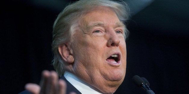 Donald Trump, president and chief executive of Trump Organization Inc. and 2016 Republican presidential candidate, speaks during a campaign rally at Plymouth State University in Holderness, New Hampshire, U.S., on Sunday, Feb. 7, 2016. Trump, far from humbled by a second-place finish in the first presidential nominating contest, bet again on his forceful personality as he battled a combative audience in New Hampshire just days before the state's crucial first-in-the-nation primary. Photographer: Andrew Harrer/Bloomberg via Getty Images