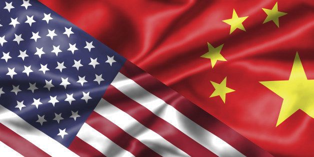 China and America : two national flags face to face, symbol for the relationship between the two countries.