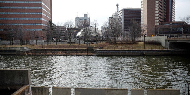 FLINT, MI - FEBRUARY 7: The Flint River with downtown behind is shown on February 7, 2016 in Flint, Michigan. Months ago the