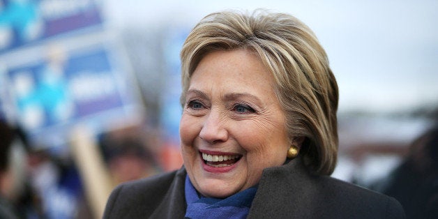 NASHUA, NH - FEBRUARY 09: Democratic presidential candidate former Secretary of State Hillary Clinton greets voters outside of a polling station at Fairgrounds Junior High School on February 9, 2016 in Nashua, New Hampshire. New Hampshire voters are heading to the polls in the nation's first primaries. (Photo by Justin Sullivan/Getty Images)