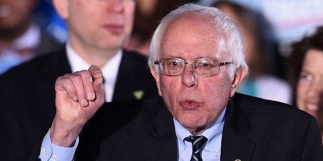 US Democratic presidential candidate Bernie Sanders speaks during the primary night rally in Concord, New Hampshire, on February 9, 2016.Self-described democratic socialist Bernie Sanders and political novice Donald Trump won New Hampshire's presidential primaries Tuesday, US media projected, turning the American political establishment on its head early in the long nominations battle. / AFP / Jewel Samad (Photo credit should read JEWEL SAMAD/AFP/Getty Images)