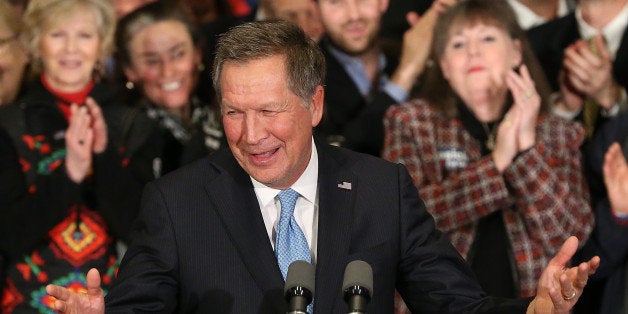 CONCORD, NH - FEBRUARY 09: Republican presidential candidate Ohio Governor John Kasich speaks at a campaign gathering with s