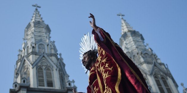 EL SALVADOR, San Salvador : The image of San Salvador's patron saint Divino Salvador del Mundo (Divine Savior of the World) is carried from the Sacred Heart Church in San Salvador on August 5, 2010 during a procession in his honor. AFP PHOTO/Marvin RECINOS (Photo credit should read Marvin RECINOS/AFP/Getty Images)