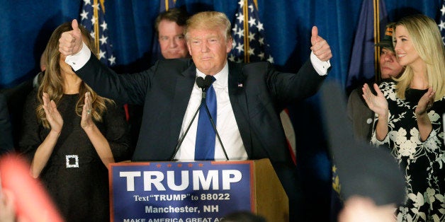 Republican presidential candidate, businessman Donald Trump gives thumbs up to supporters during a primary night rally, Tuesd