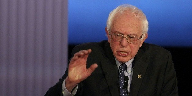 US Democratic presidential candidate Bernie Sanders participates in the PBS NewsHour Presidential Primary Debate with Hillary