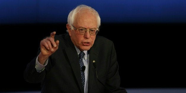 US Democratic presidential candidate Bernie Sanders participates in the PBS NewsHour Presidential Primary Debate with Hillary
