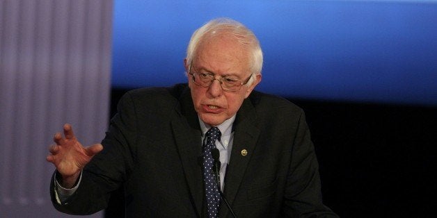 US Democratic presidential candidate Bernie Sanders participates in the PBS NewsHour Presidential Primary Debate with Hillary