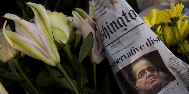 WASHINGTON, DC - FEBRUARY 14: A makeshift memorial for Supreme Court Justice Antonin Scalia is seen at the U.S. Supreme Court, February 14, 2016 in Washington, DC. Supreme Court Justice Antonin Scalia was at a Texas Ranch Saturday morning when he died at the age of 79. (Photo by Drew Angerer/Getty Images)